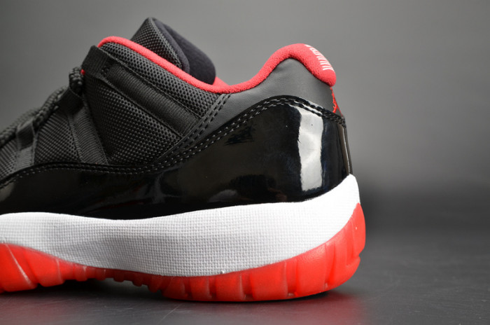 air jordan 11 retro low "bred" black/ red mens 528895-012